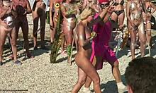 Nudist sluts perform their ritualistic dancing on a beach